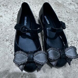 Mini Melissa Black Dress Shoes with Bow Detail